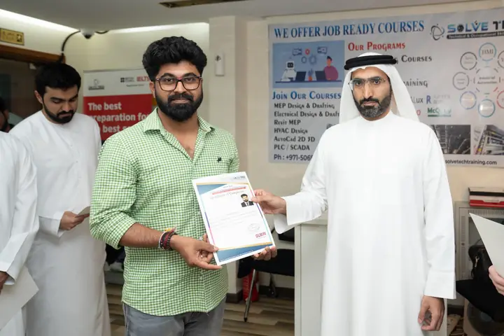 Learner receiving a course certificate at Solve Tech